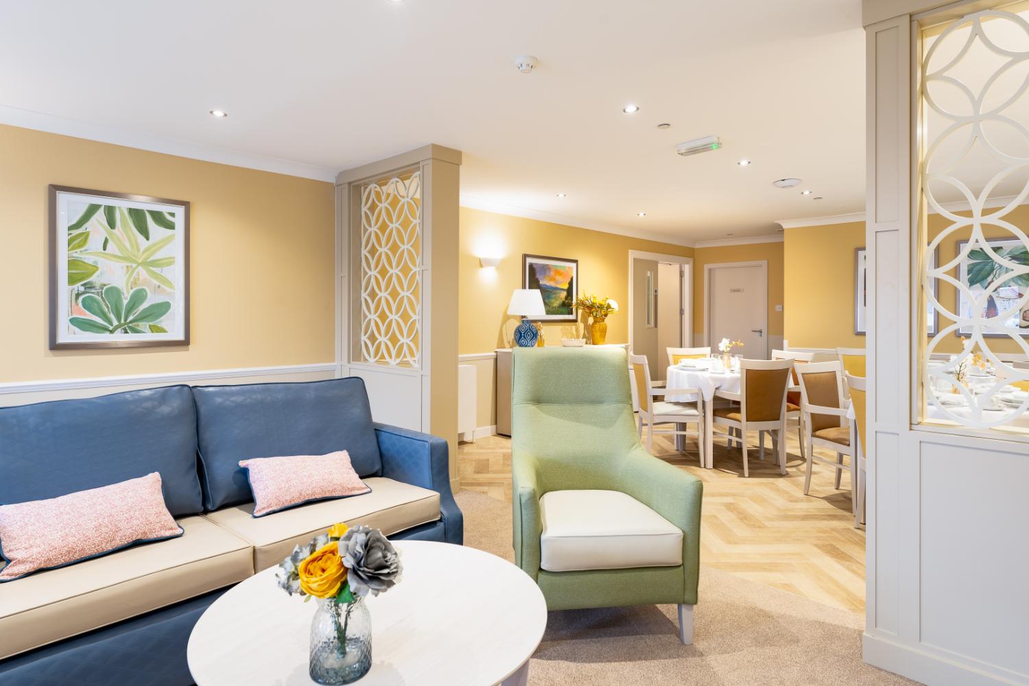 communal area with pastel colour sofas and armchairs