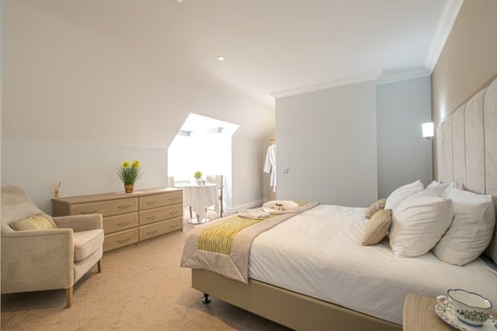 Fleming Court Care Home - Senior living white bedding