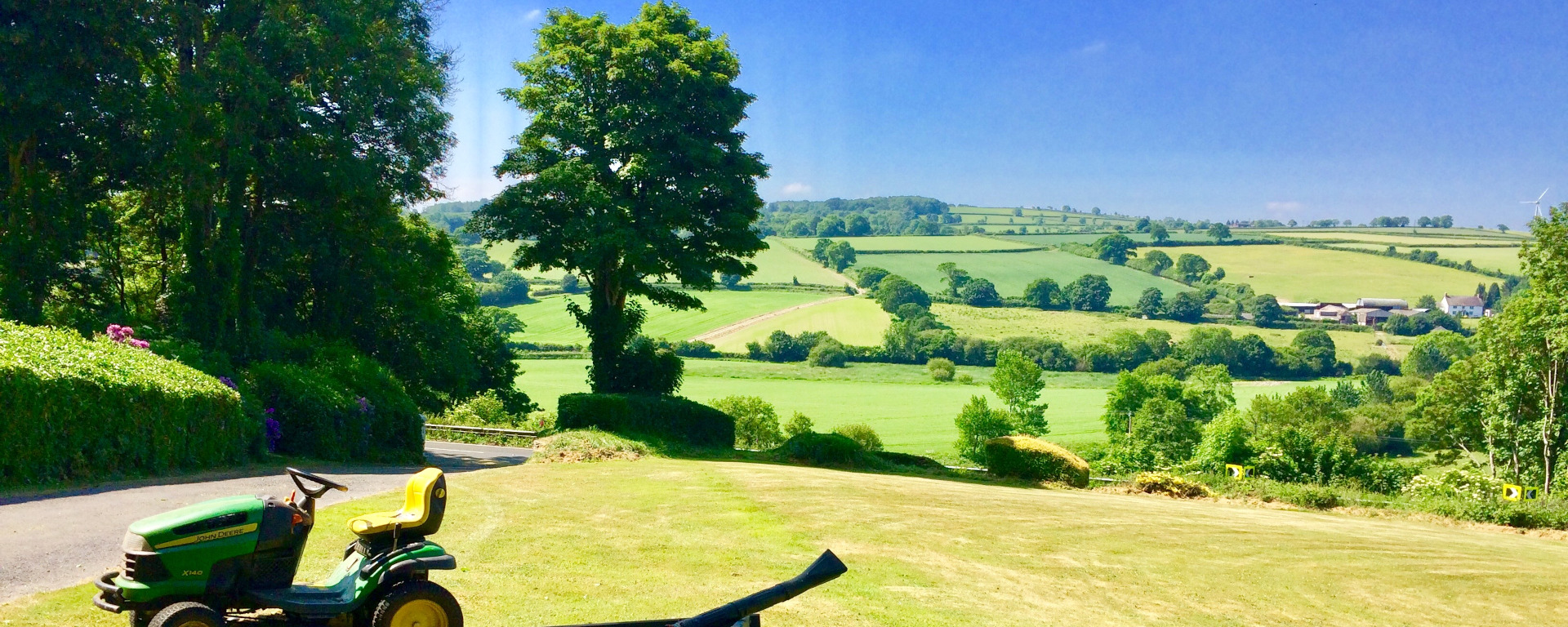 Llwyndyrys front lawn view over the valley