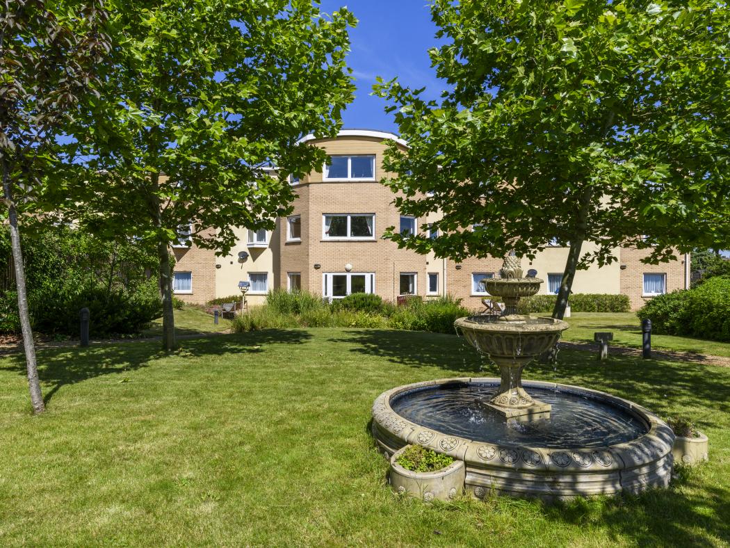 exterior of Cherry Blossom Care Home garden and fountain